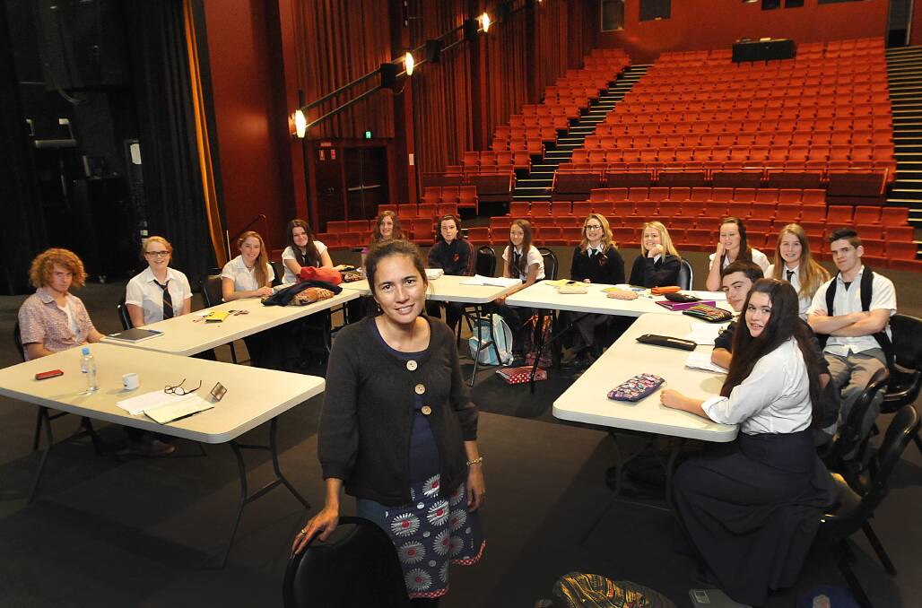 DRAMATIC CHARACTERS: Vanessa Bates with a group of Tamworth students dissecting characters and working on HSC monologues. 
Photo: Geoff O'Neill 060614GOH02