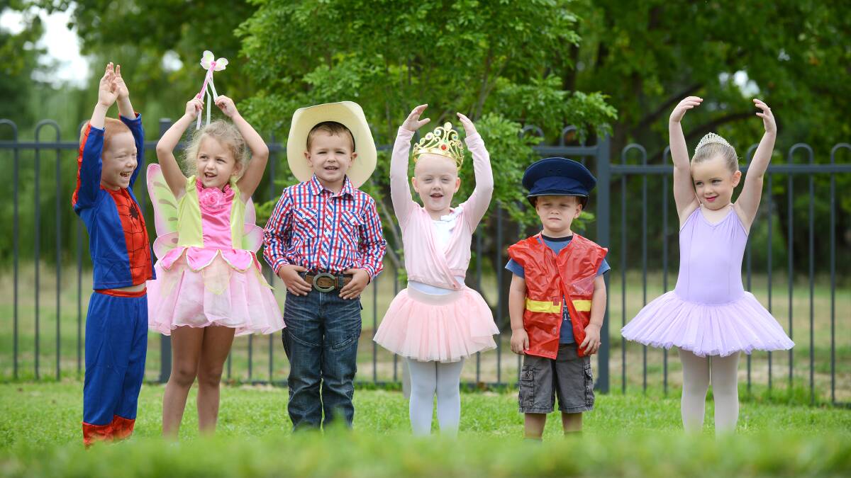HIGH HOPES: Kootingal and District Pre-School children Spiderman Jack Gosbell, butterfly princess Caelarni Taylor, cowboy Cooper Higgins,
ballerina Netta-Rae O’Dell, policeman Byron Hobden and ballerina Matilda Thompson dressed up to support children with cancer. 
Photo: Barry Smith 280214BSB04