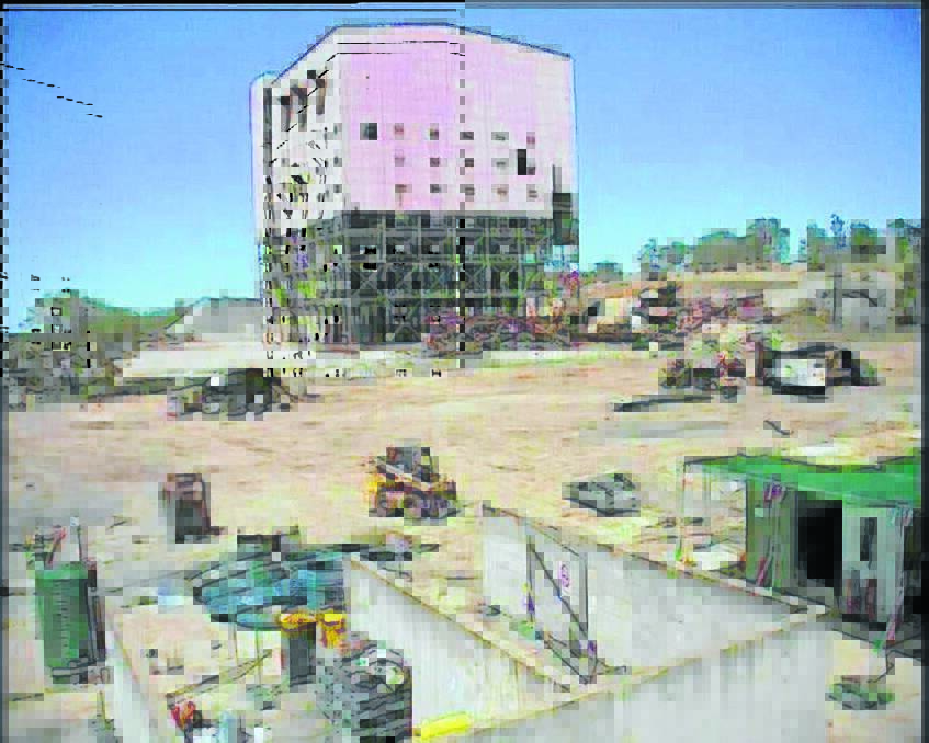 BEFORE: Screenshots from a webcam installed at the derelict Woodsreef mine show how the landscape changed with the demolition of the old mill house.