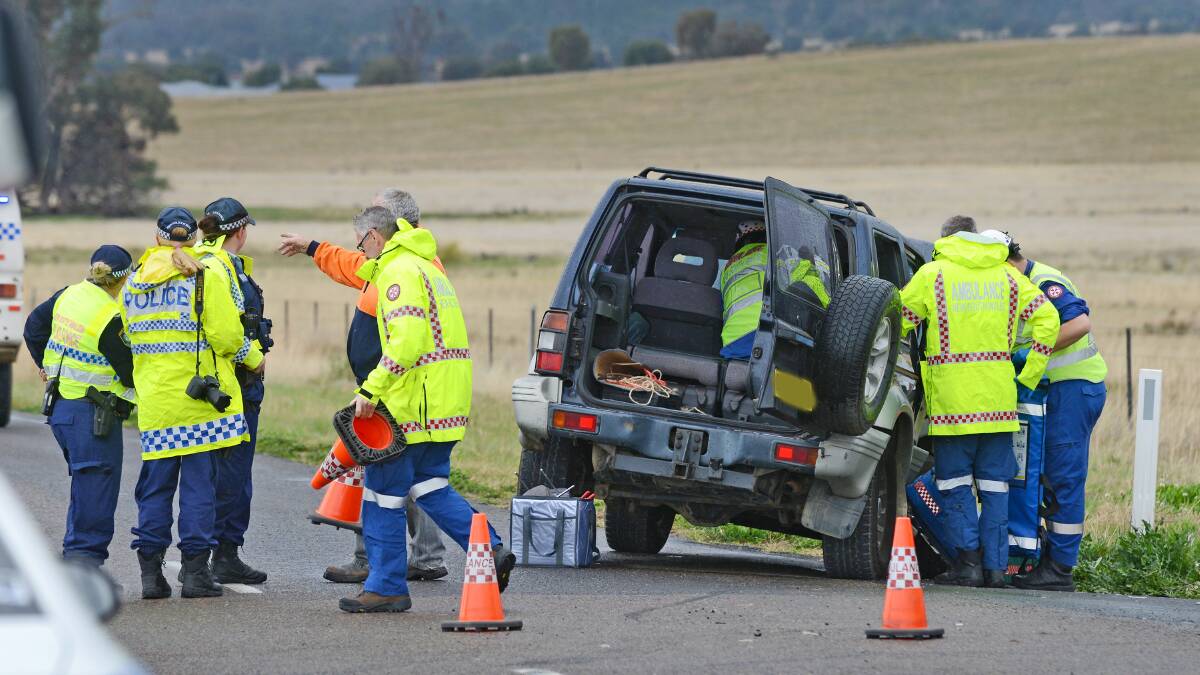 SMASH: It took just under an hour to free a woman after the crash on Moore Creek Rd near Tamworth yesterday morning. Photo: Barry Smith 020914BSB04