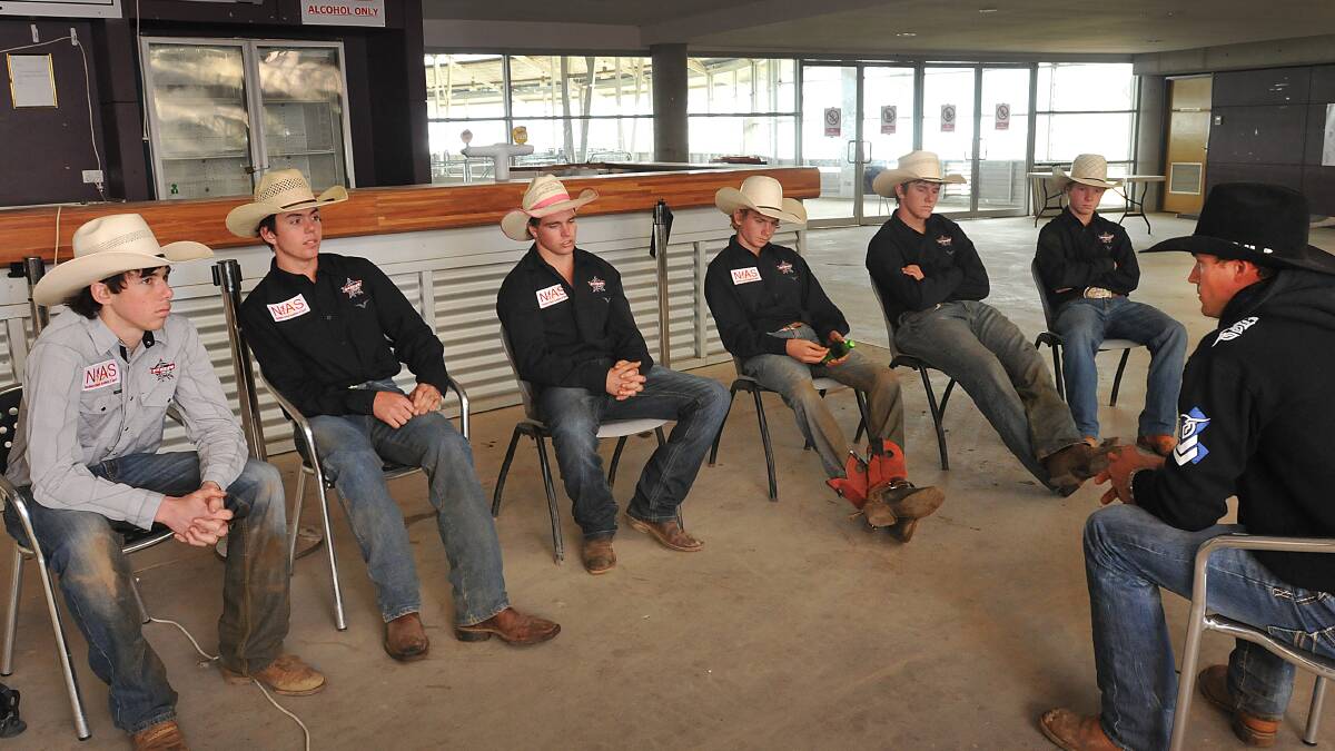 NIAS bullriders (rom left) Daniel Rogan, Beau Richardson, Ben Butler, Mick Knight, Jessie Glass and Nick Penrose listen intently to head coach Dave Kennedy (right) at their first coaching session on the weekend. Photo: Geoff O'Neill 140614GOD02