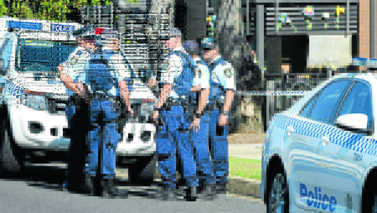 SCENE OF THE CRIME: Police rushed to the public housing block in Robert St on December 18 after Peter Thomas Jones stabbed a man in the chest.   181213A23