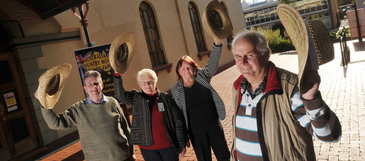 HATS OFF: From left, volunteers Eric Scott, Margaret Lansley, Hilary Scott and Kevin Lansley prepare to bid farewell to the Mechanics’ Institute building, which has housed the Australian Country Music Hall of Fame for more than 20 years. Photo: Gareth Gardner 010714GGB02