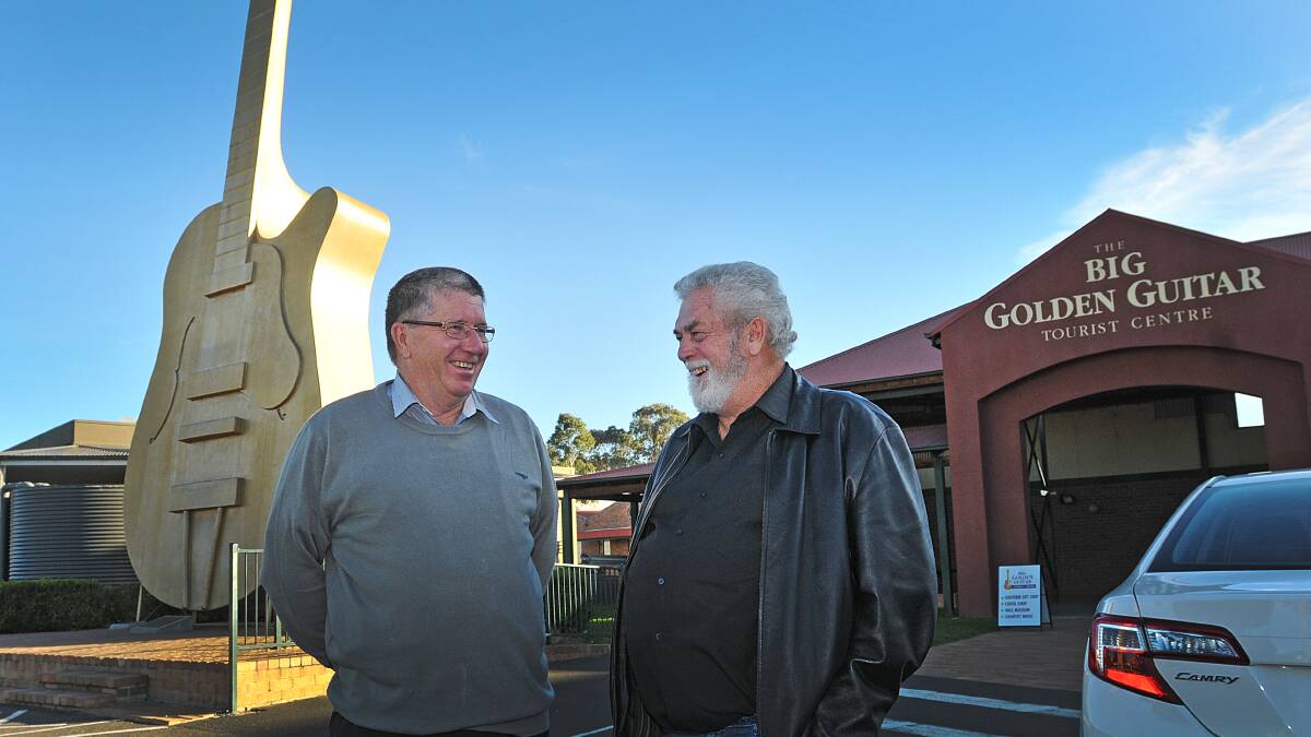 TOURISM WIN-WIN: Tamworth Regional Council mayor Col Murray and Big Golden Guitar Tourist Centre owner Tom Coultan are looking to the future of Tamworth’s Visitor Information Centre. 
Photo: Geoff O’Neill 150514GOF02