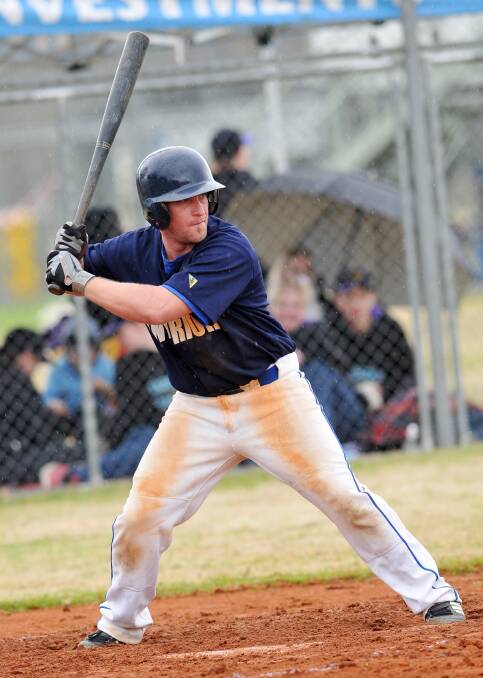 Andrew Slagg hits for Interport in last year’s June Baseball A Grade Final. 
Photo: Geoff O’Neill 100613GOA02