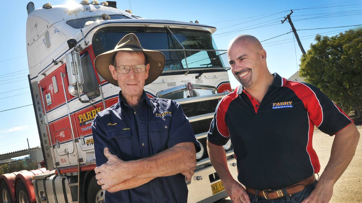GREAT HONOUR: Moonbi truck driver Norm Ekman (left) will be inducted into the National Road Transport Hall of Fame next month. His employer Greg Parry described Mr Ekman as one of the best drivers in the company’s 50-year history. Photo: Gareth Gardner 230714GGB003