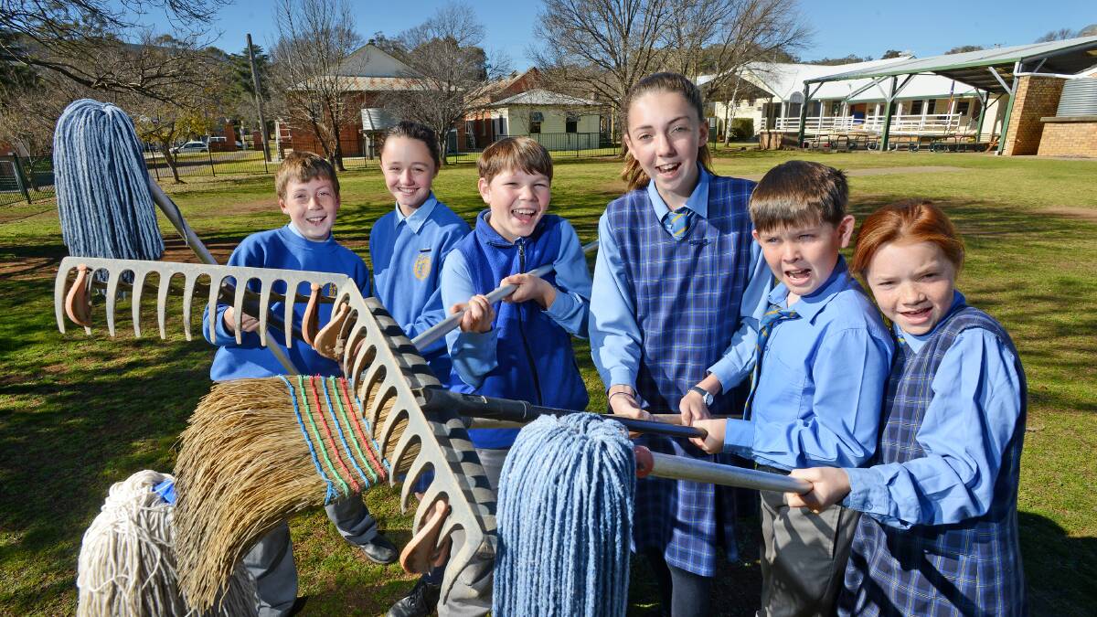STUDENTS CLEAN UP: Joe Worley, Charlie Chapman, Henry McParland, Meg Worley, Brent Thompson and Nikita Eveleigh are preparing to host the NSW Tidy Towns Awards. Photo: Barry Smith 310714BSA02
