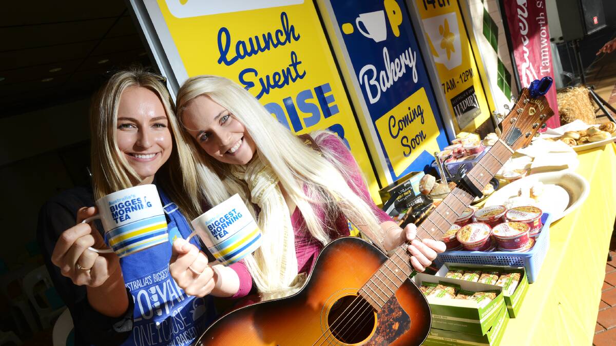 TEA FOR TWO: Cancer Council’s Sarah Royall with country singer-songwriter Aleyce Simmonds launching the Biggest Morning Tea season. Photo: Barry Smith 140514BSB03