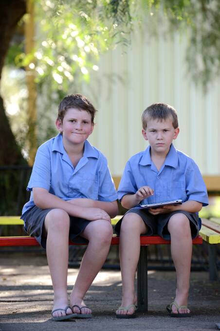 BRIGHT MINDS: Nicholas McCluand and Jayden McCluand-Morley are just two of the estimated 230,000 Australians who have been diagnosed with autism spectrum disorder. Photo: Barry Smith 010414BSE01