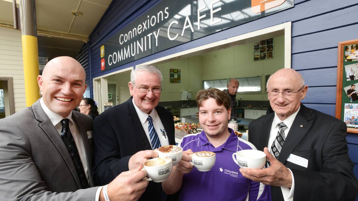 NEW CHALLENGE: Celebrating the Connexions Community Cafe are Newcastle Permanent Charitable Foundation executive officer Jason Bourke, Challenge CEO Barry Murphy, cafe worker Luke Pritchard and the Charitable Foundation’s acting chairman Barrie Lewis. Photo: Barry Smith 040714BSB02