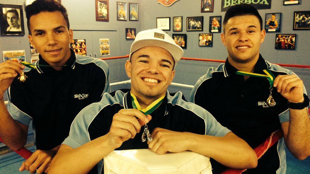 Celebrating their Golden Glove success in Queensland are Tamworth boxers (from left) Isaiah Spearim, Josh Moncaster and Brad Moncaster