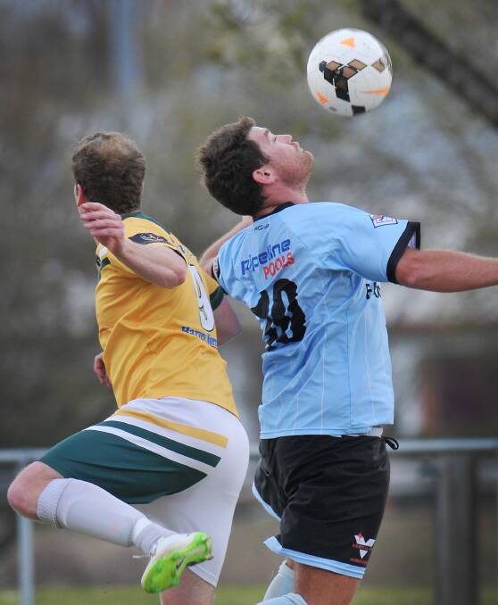 Tim Smith chests down this high ball for Tamworth FC against Joeys FC.  Photo: Gareth Gardner  030814GGE13