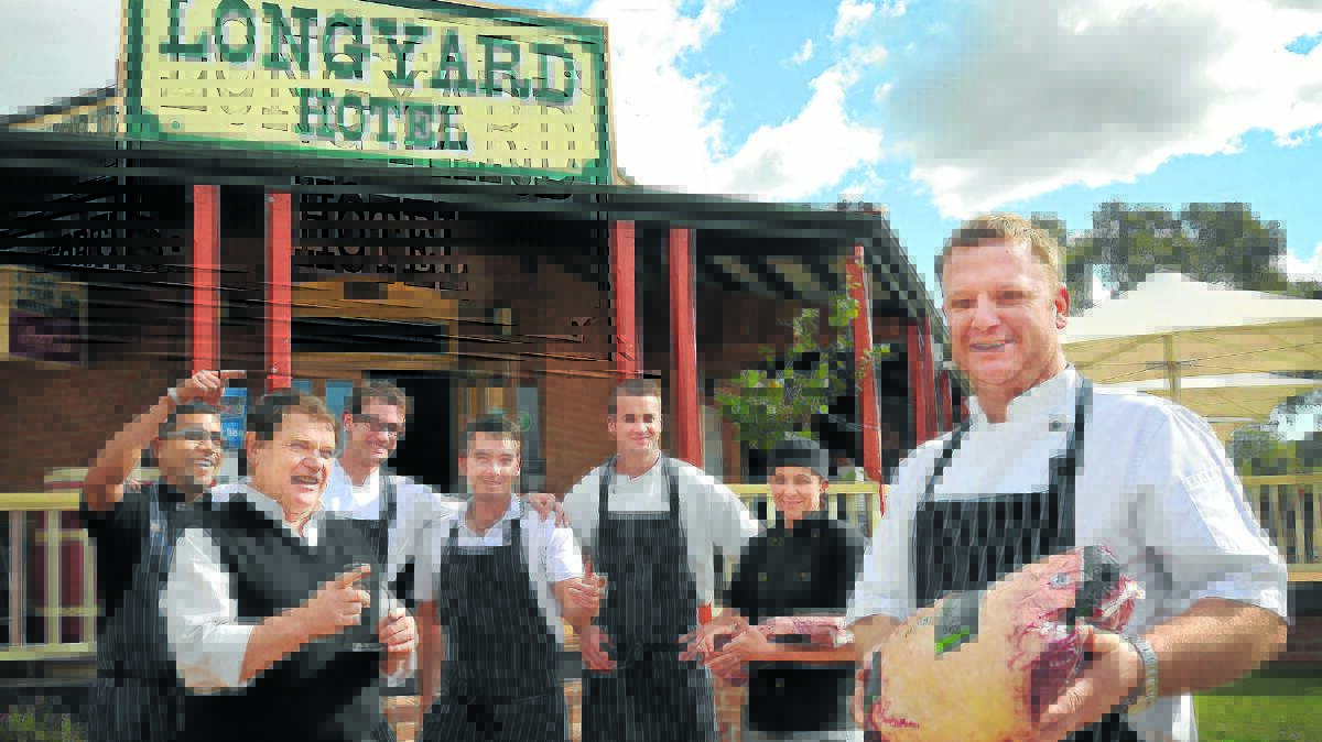 MEATING OF MINDS: The Longyard Hotel will this month serve up two prize cattle bought at last week’s Landmark Beef Championship in a unique – and controversial – promotion. Backing the campaign are staff members (back, from left) Ravikant Manadeo, Murray Jamieson, Daniel Roworth, Jason Capararo, Colin Knights, Peta Taylor and (front) The Pub Group executive chef Nick Lockyer. Photo: Gareth Gardner 030914GGG04