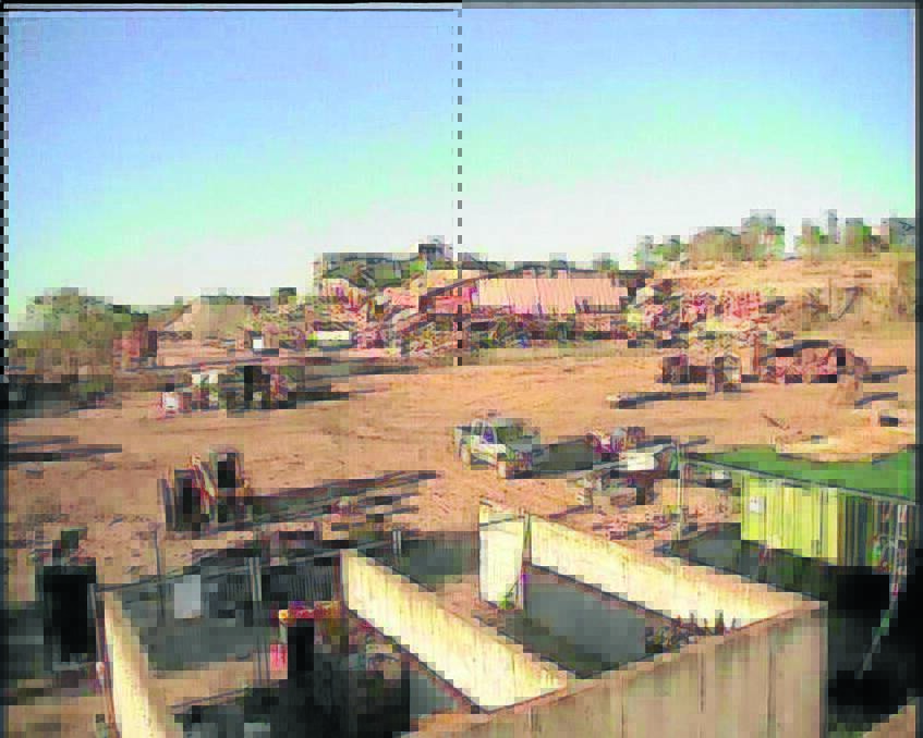 ... AND AFTER: Screenshots from a webcam installed at the derelict Woodsreef mine show how the landscape changed with the demolition of the old mill house.