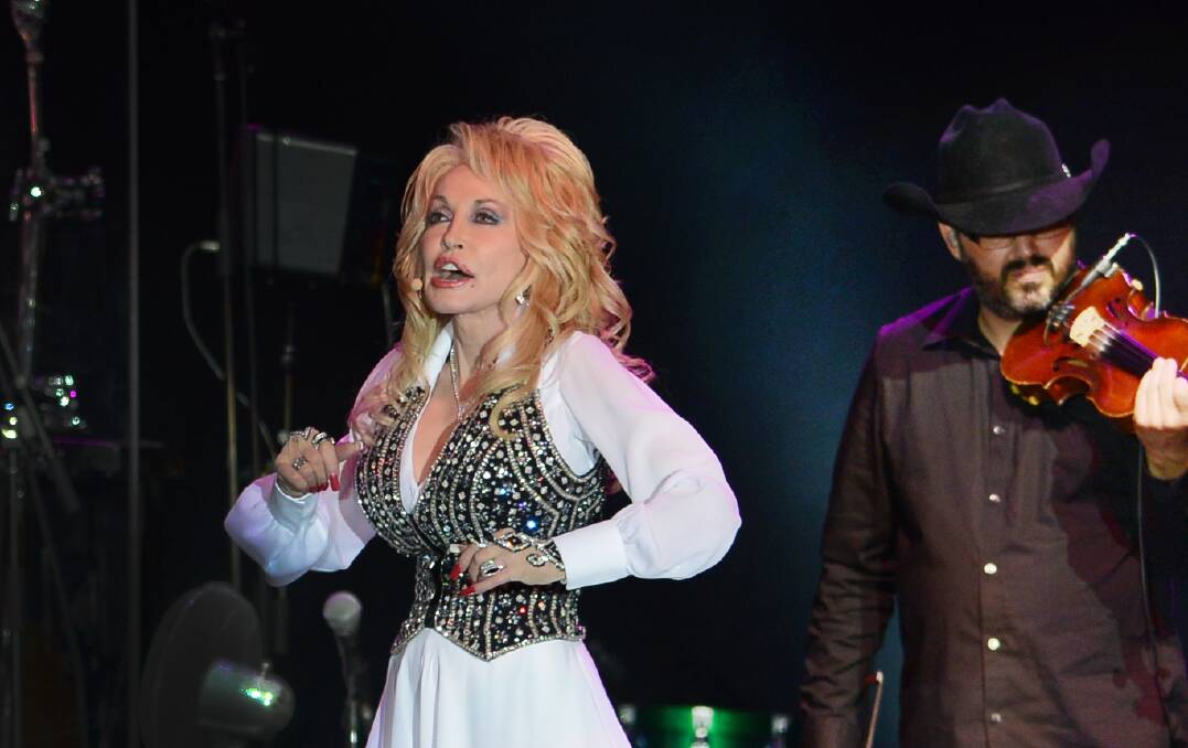 SPARKLING: Country music superstar Dolly Parton packed out the Tamworth Regional Entertainment and Conference Centre last night for her concert. Photo: Gareth Gardner 160214GGD25
