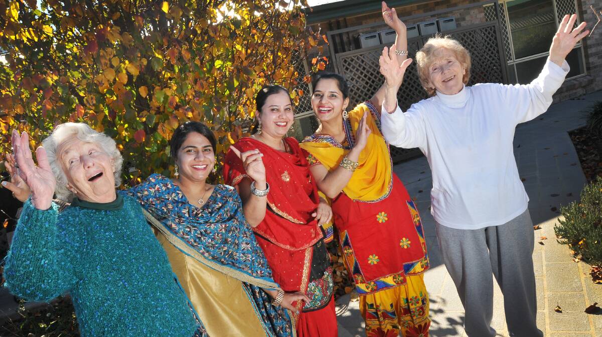 STEPPING OUT IN STYLE: Marion White, Mandeep Kaur, Nicky Parmar, Pardeep Khakh and Shirley Sherlock bust some moves at Bupa Tamworth. Photo: Gareth Gardner 030714GGA01