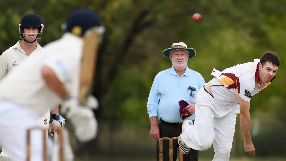 Ben Semmler lets fly for City United on a day where he took 10 wickets including a hat trick. Looking on are West Tamworth's Tim Kensell (left) and umpire Arthur Yates.  Photo: Gareth Gardner  210215GGB07
