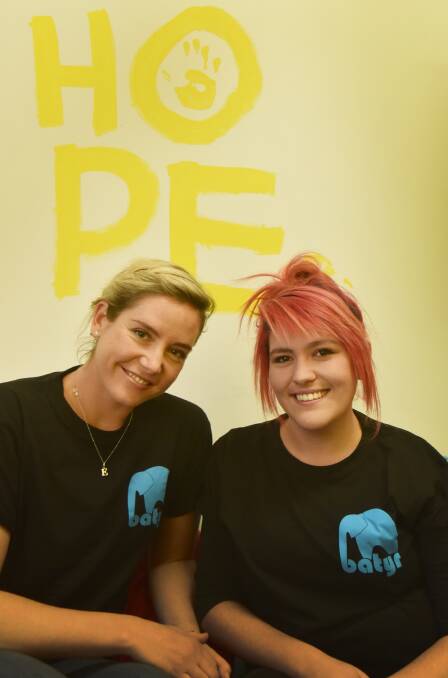 FINDING VOICE: With the support of Batyr Tamworth co-ordinator Emily Herbert (left), Amy Devrell (right) is using her experience with mental illness to inspire others to seek help. Photo: Geoff O'Neill 190615GOG01