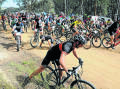 Around 217 riders take off in the first leg of the Fairfax Media Evocities MTB Series held in the Kinross State Forest near Orange. Photo: JUDE KEOGH 
