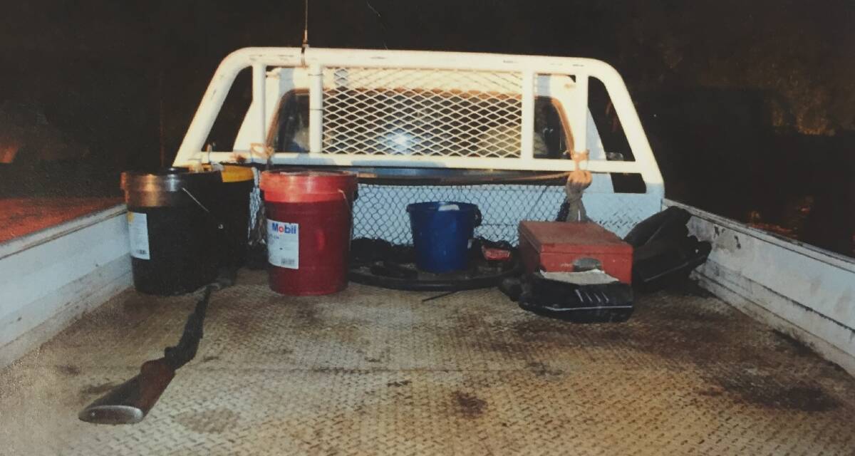 Crime scene exhibits in the trial of R v Ian Turnbull for the murder of Glen Turner. View showing the position of the .22 Cal Browning pump action rifle and the contents of the rear tray area of the white diesel Turbo Diesel Utility.  Pic: Supplied