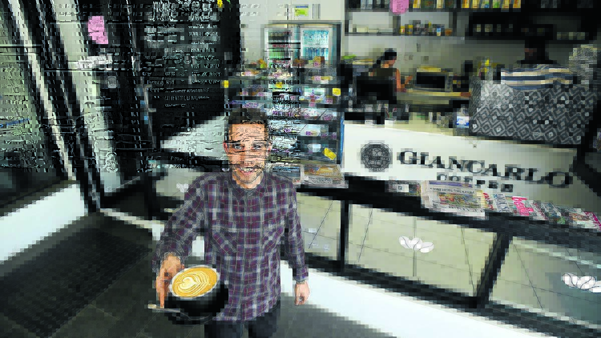 BELLISSIMO: New owner of The Bean and Barista Nico Andrigo says it has been a big step up taking the reins of his own shop. Photo: Gareth Gardner 060516GGC01
