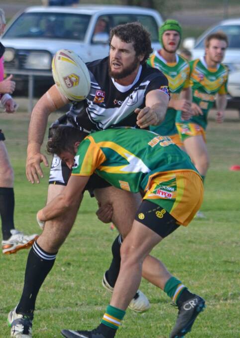 Thomas Brown offloads against Boggabri last Saturday. He’ll be leading the Magpie swoopers again today against Bundarra. Photo: Chris Bath 210516CBA10