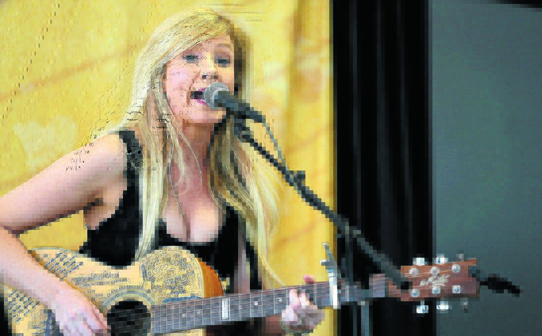 Dianna Corcoran performs at the Music City Stage.