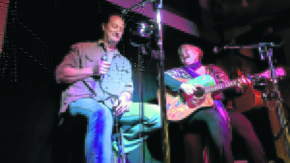 LOVE AND LAUGHTER: Damon Morton and his lovely wife, Lyn Bowtell having some fun on stage at the Jolly Roger.
