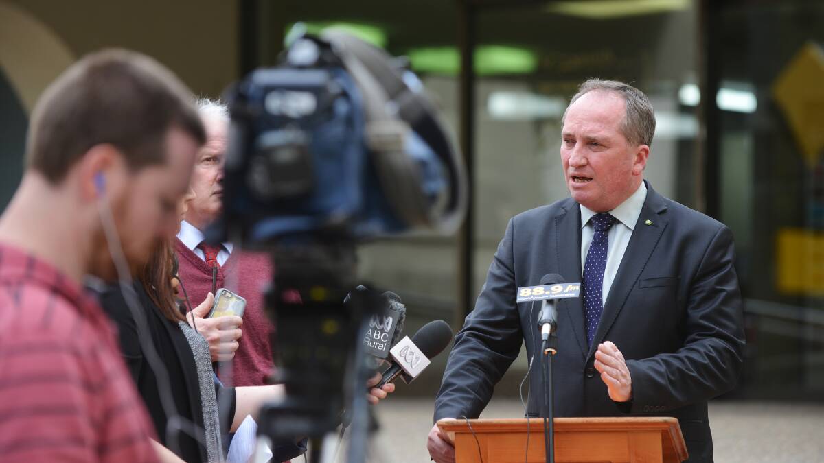 FLOWING ON: New England MP Barnaby Joyce announces the water infrastructure funding outside Tamworth Regional Council yesterday. Photo: Barry Smith 100616BSC07
