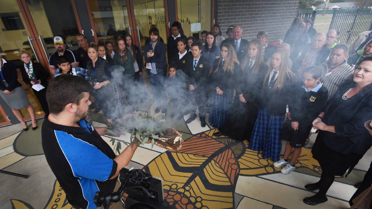 ALL ABOUT RESPECT: Marc Sutherland  conduced the smoking ceremony at The Youthie’s Sorry Day ceremony.  Photo: Gareth Gardner 260516GGB05