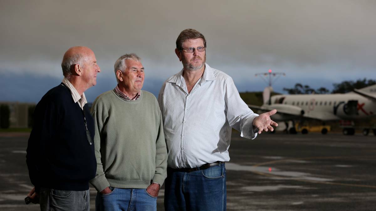 FLASHBACK: From left, Armidale regional airport users group chairman Don Tydd, Edwards Aviation owner Brad Edwards and former Armidale Dumaresq councillor Andrew Murat inspect the airport in 2014 with the first tranche of a $20 million makeover for the site. Photo MATT BEDFORD