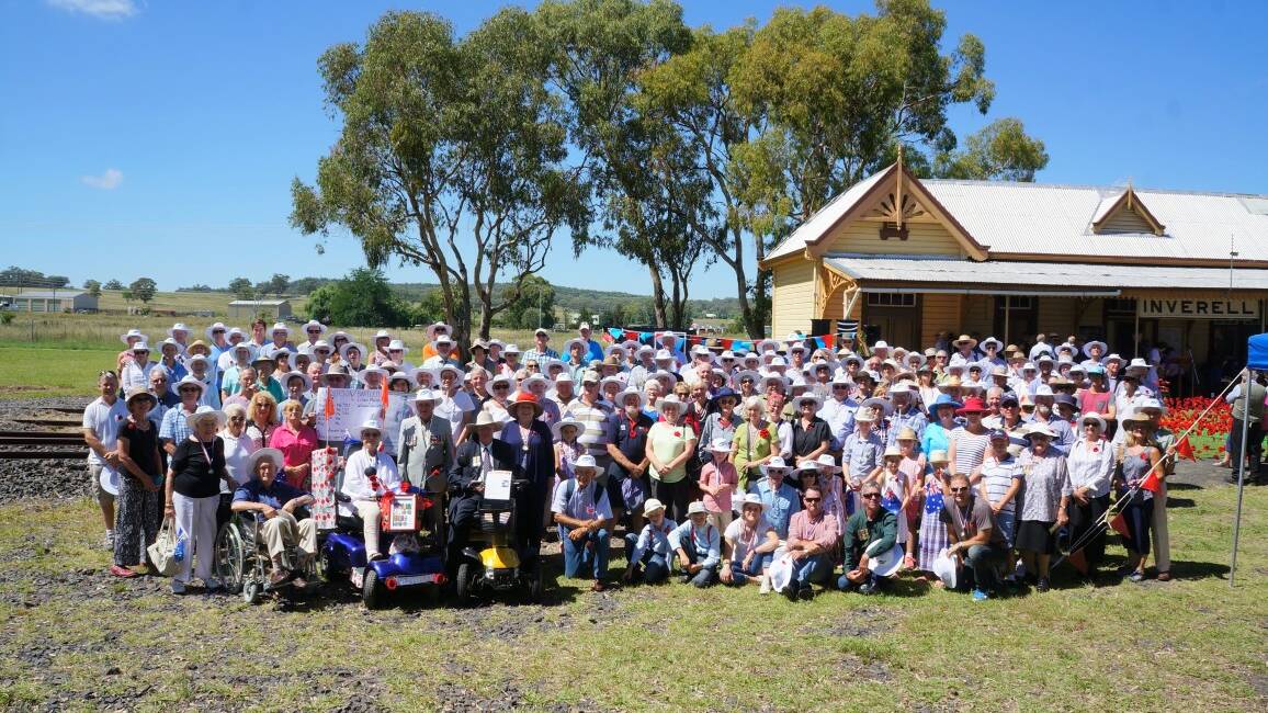 Group shot of the descendants of the Kurrajongs for the Inverell Kurrajong Re-enactment March on January 10, in front of the original Inverell Railway Station at Inverell's Pioneer Village.