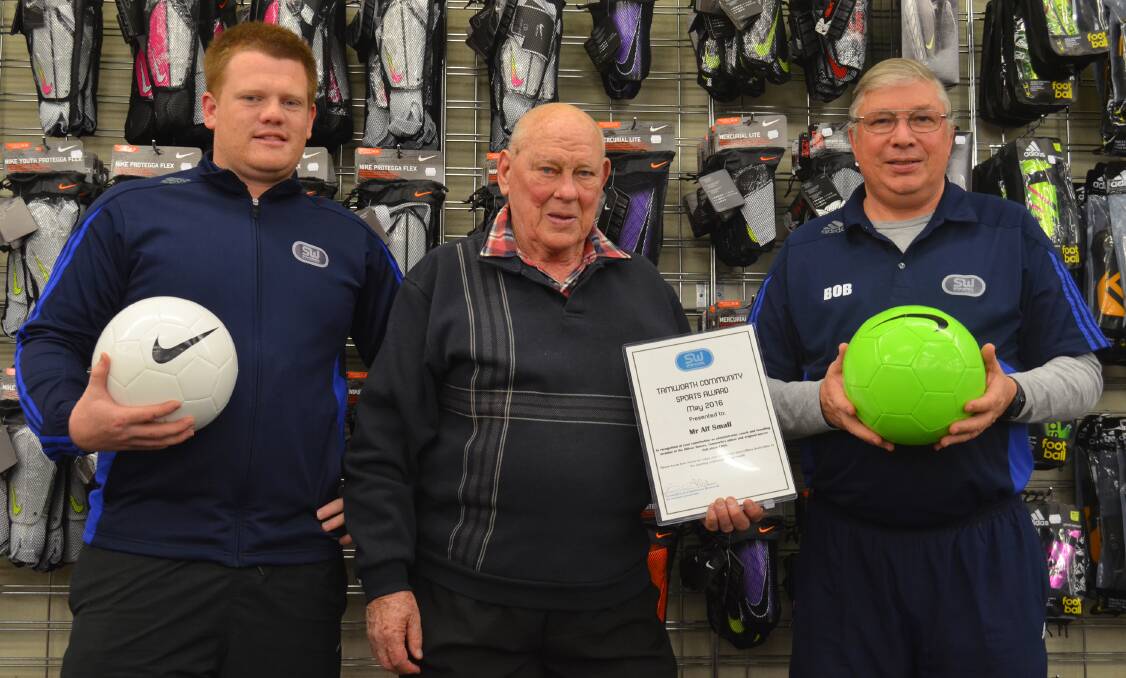 Sportsman’s Warehouse managers Rick Craig and Bob Barber with long serving Hillvue Rovers president and founder Alf Small who was recognised with the Volunteer of the Month Award for his service. Photo: Chris Bath 300616CBA01
