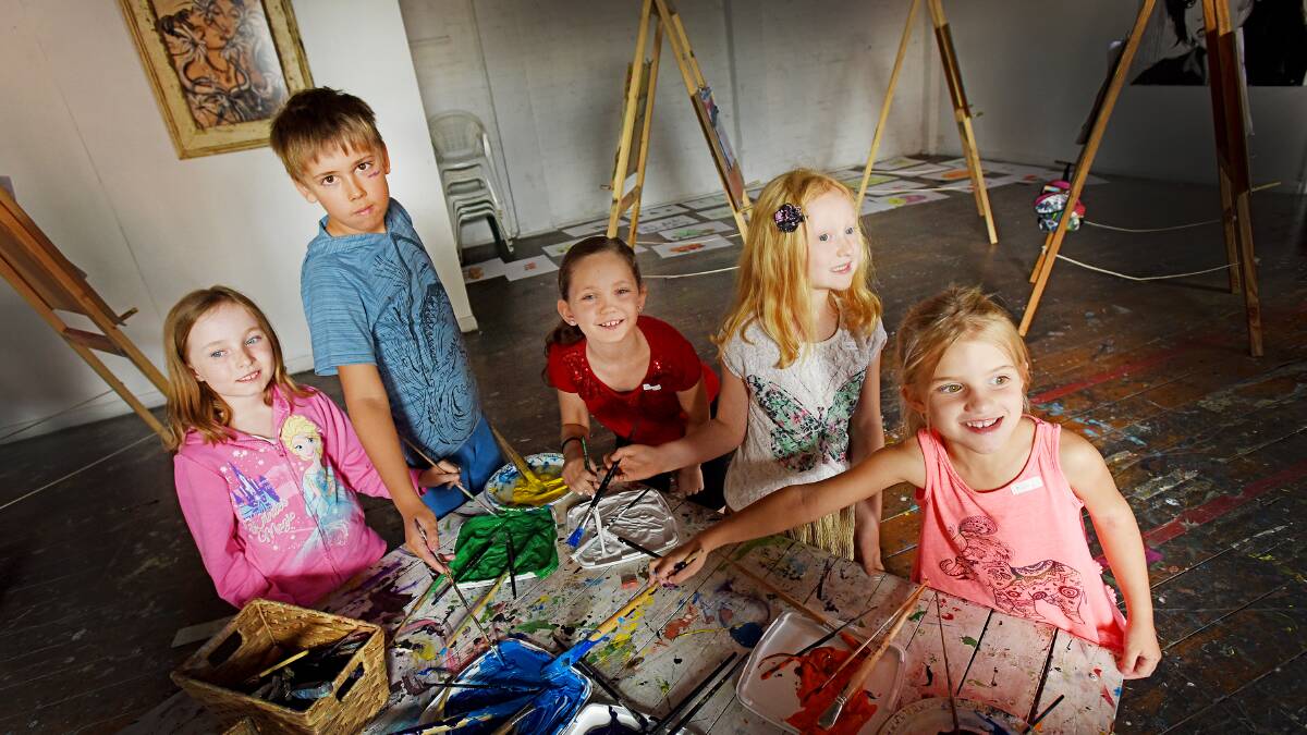 COLOUR ME HAPPY: Bronte Clegg, 7, Nikita Potapov, 7, Leyna George, 8, Charlotte Mahony, 6, and Ruby Herden, 6, at the Loft Art Studio. Photos: Gareth Gardner 040116GGB03