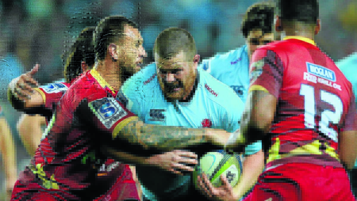 Waratahs prop Paddy Ryan, here in action against the Queensland Reds last year, can't wait to rip into the new Super Rugby season. Photo: Getty Images