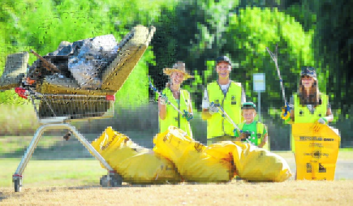 TOP PICKERS: Julia Farina and Brad Gill, five-year-old Ethan and 11-year-old Georgia Lancsar collected a variety of rubbish near Jewry St bridge in Tamworth. Photo: Barry Smith 060316BSA04