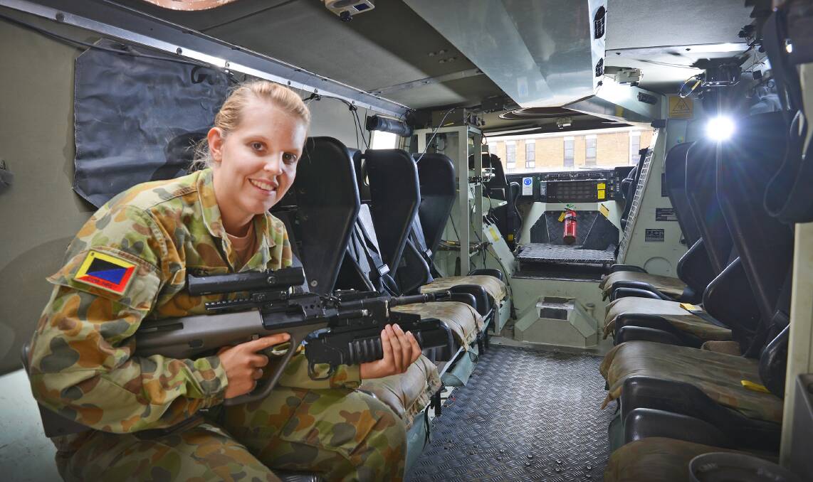 FIRST WOMAN: Trooper Sara Spokes has joined the 12th/16th Hunter River Lancers as the first female cavalry scout in the Australian armoured corps. Photo: Barry Smith 160316BSC08