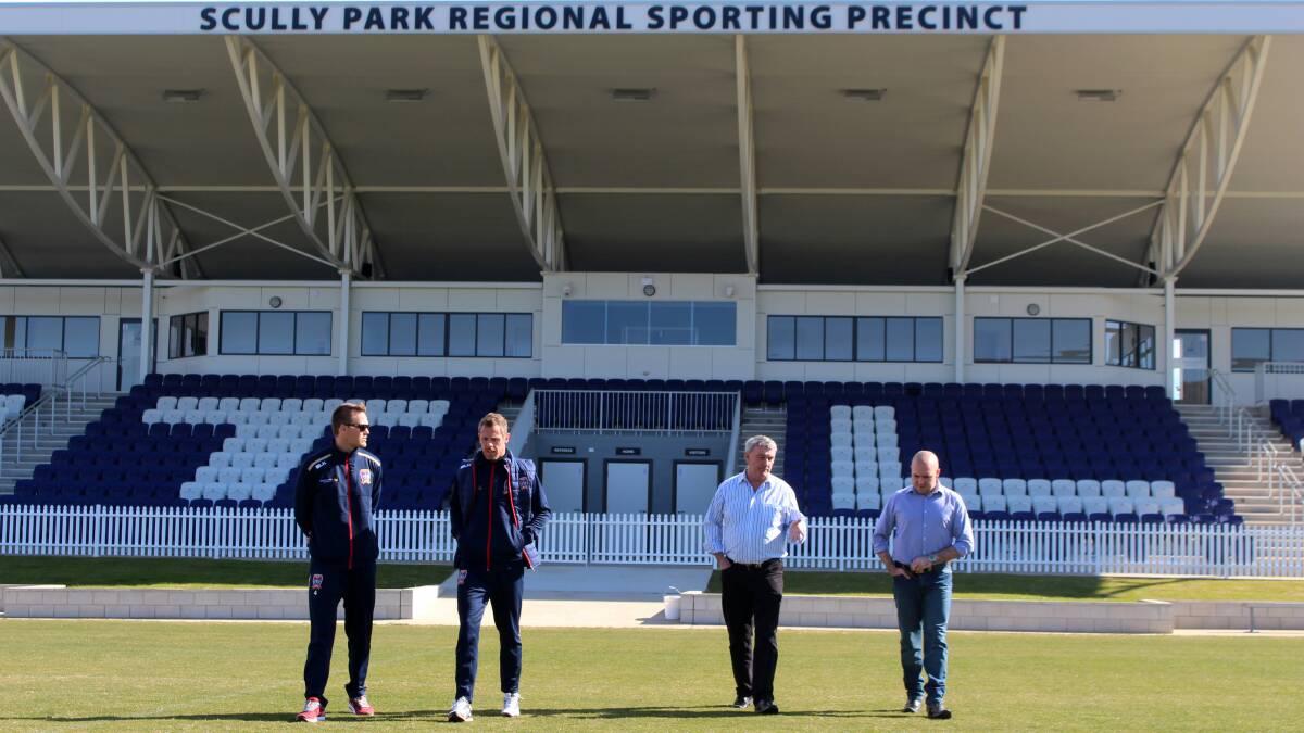 Newcastle Jets player Nigel Boogaard (left) and head coach Scott Miller (second from left) inspect the Scully Park Regional Sporting Precinct in Tamworth alongside Wests CEO Rod Laing and Craig Dunstan (right),  Destination Tamworth manager.