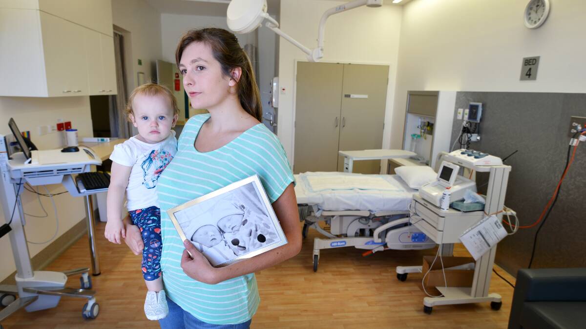 MULTIPLE LOSS: Emily Bridge, with 14-month-old Charlotte, in the maternity unit of Tamworth hospital, where she hopes to see two cuddle cots in the future, in memory of her twin sons, Andrew and Eric, who passed away in January 2014. Photo: Barry Smith 010416BSB01