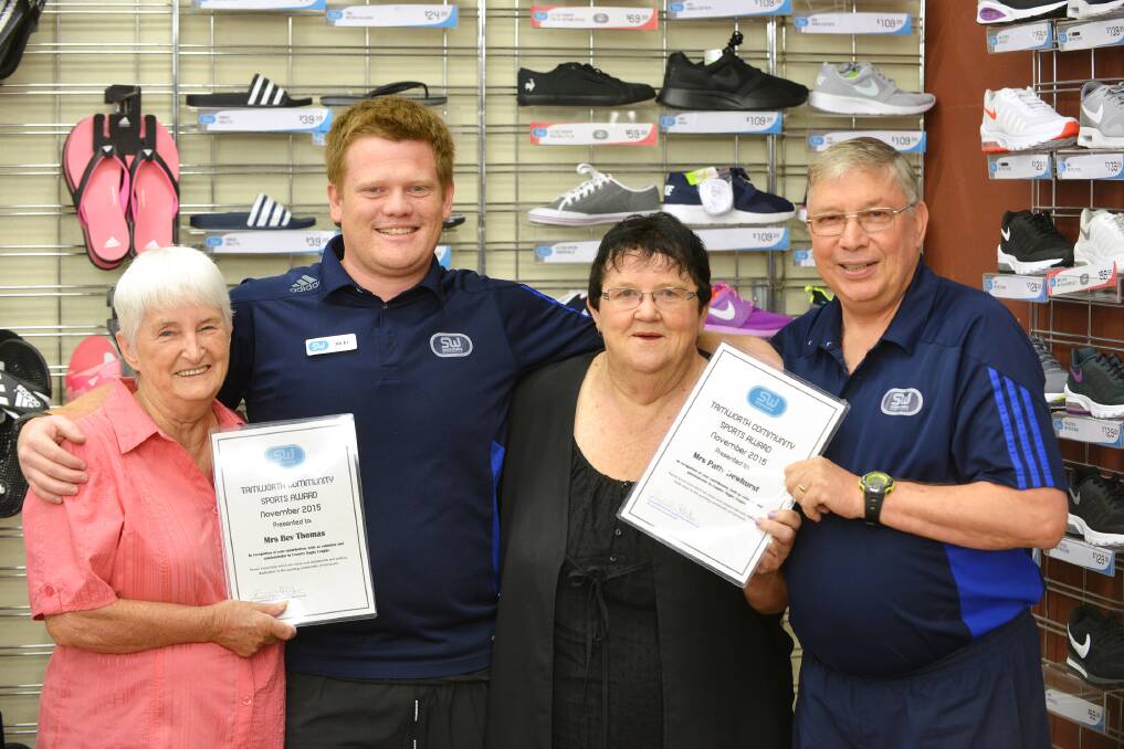 Sportsman Warehouse December Volunteer of the Month winners Bev Thomas (left) and Patty Dewhurst (second from right) receive their certificates from manager Ricky Craig (second from left) and assistant manager Bob Barber (right). Photo: Barry Smith 181215BSB01