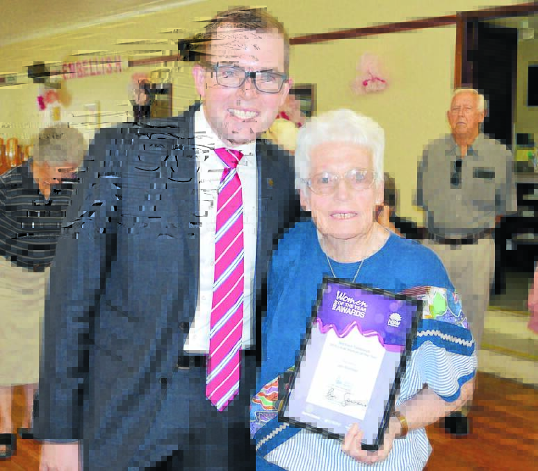 SELFLESS DEDICATION: Jan Sharman is the Local Woman of the Year for the Northern Tablelands, here with MP Adam Marshall at her surprise morning tea.