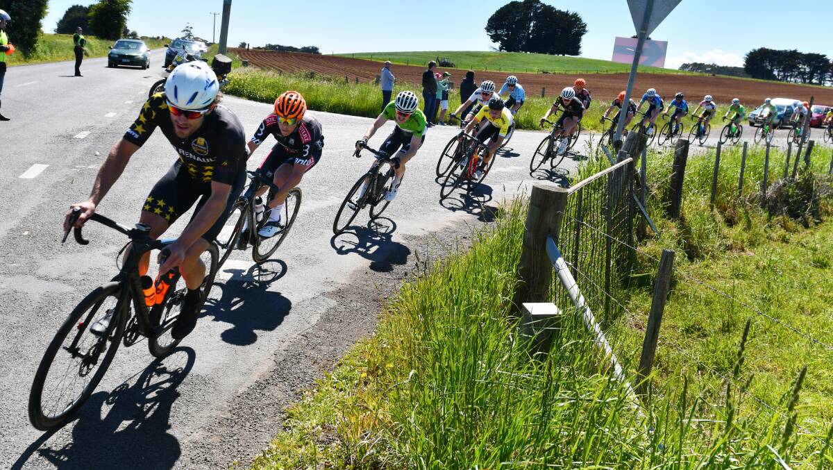 Cornering the market: The men's field keeps the tempo high en route to Gunns Plains.