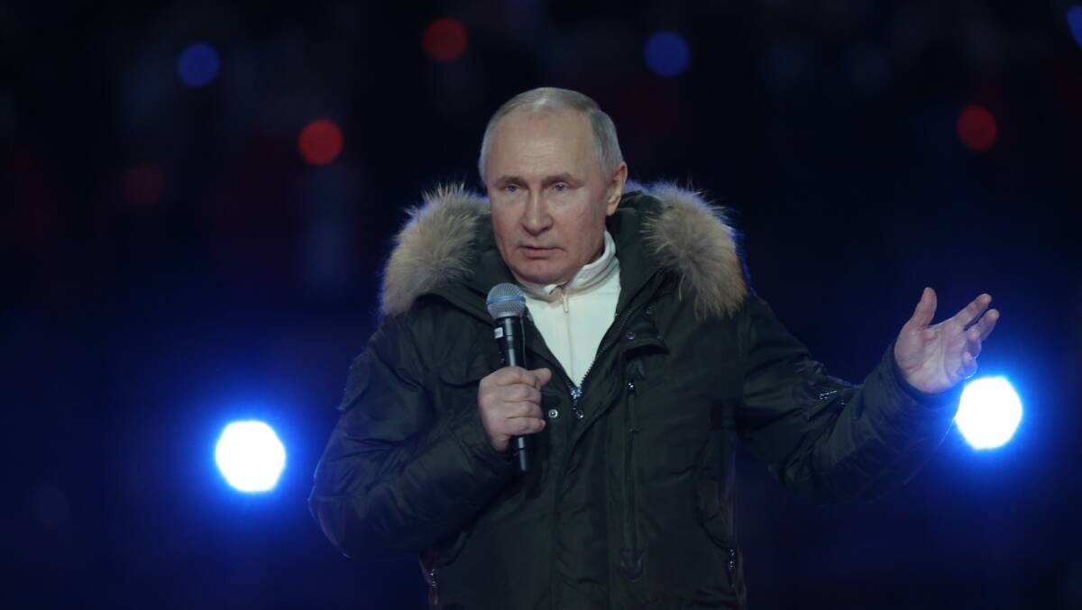 Russian President Vladimir Putin speaks during a concert marking the seventh anniversary of the annexation of Crimea on March 18, 2021. Picture: Getty Images