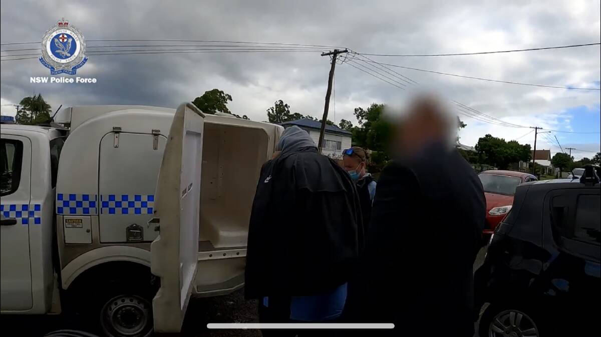 ARRESTED: One of the men being arrested. Picture: NSW Police
