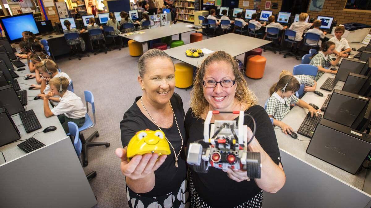 SKILLS: Teachers Lisa O'Callaghan and Amber Chase are off to Melbourne next week to share their tech skills. Photo: Peter Hardin 150317PHA18