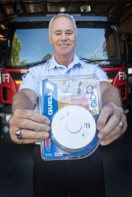SAFETY FIRST: NSW Fire and Rescue Inspector Peter Nugent has urged residents to ensure they have working smoke alarms. Photo: Peter Hardin 160418PHE020