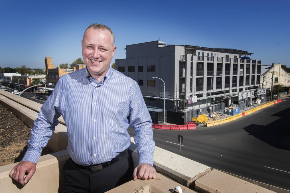 PROGRESS: CH on Peel owner Jye Segboer at the front of the new accommodation wing on Brisbane Street. Photo: Peter Hardin 100418PHA006