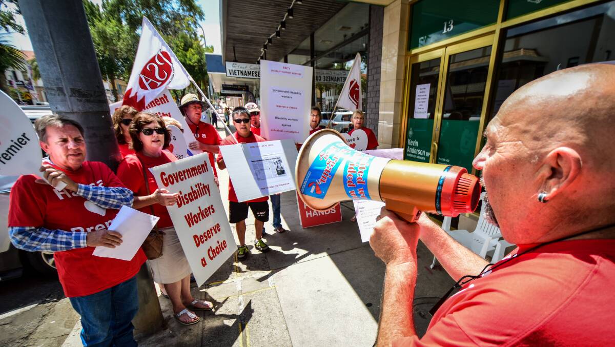 PROTEST: Disability workers and Public Service Association officials rallied outside Kevin Anderson's office on Tuesday. Photo: Simon McCarthy