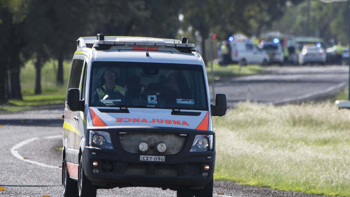 A ambulance leaves the scene. Photo: Peter Hardin