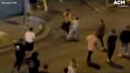 UGLY SCENES: Video has emerged of two men brawling in Newcastle on Sunday morning before a third man is stabbed. 